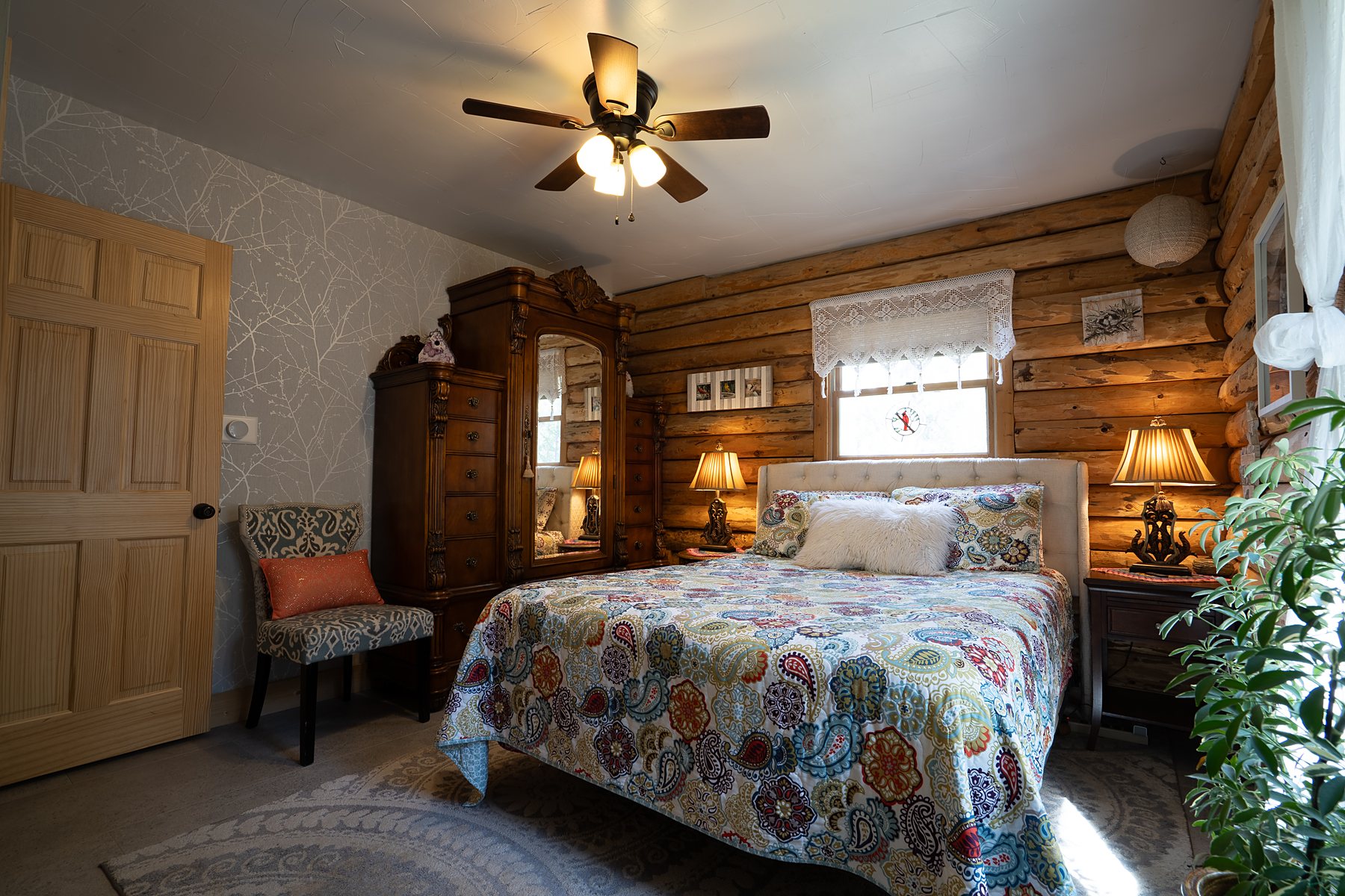 Staged bedroom with warm natural light