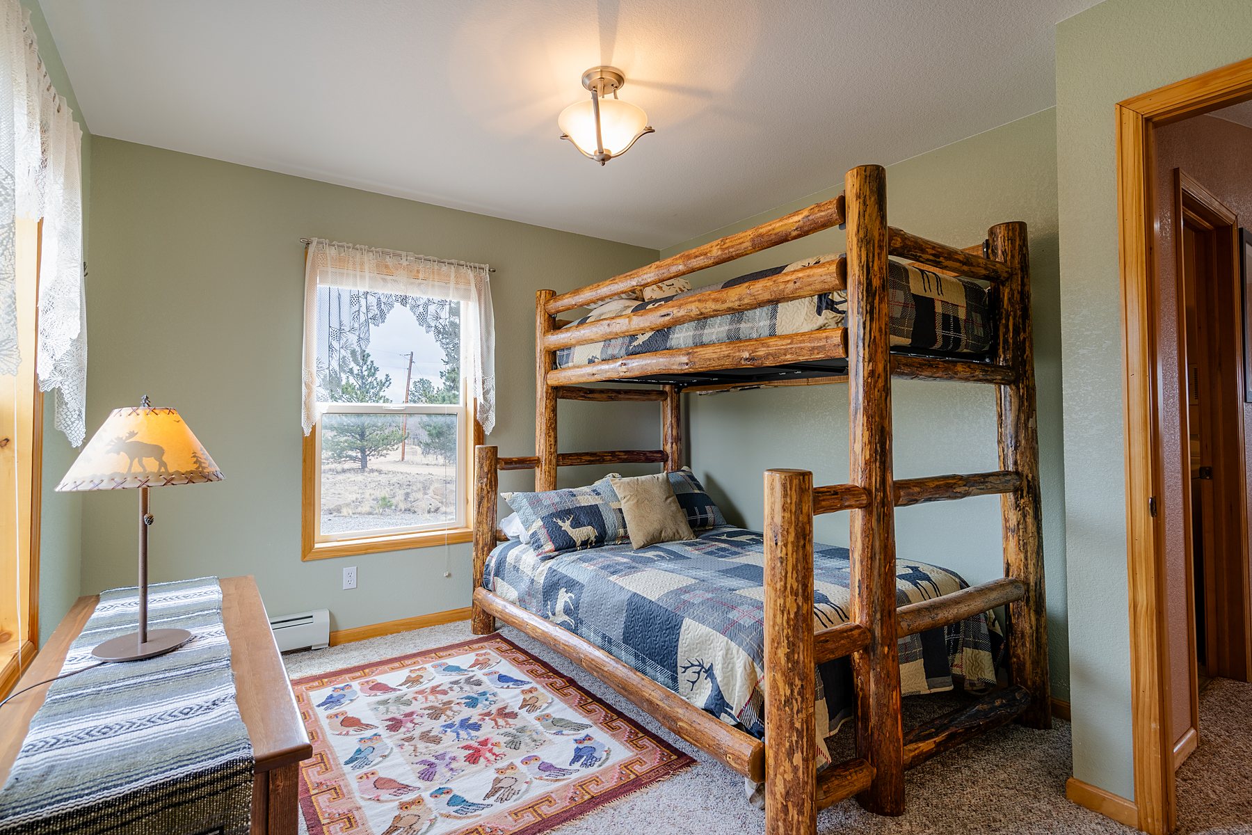 Built-in bunk room with wood finishes